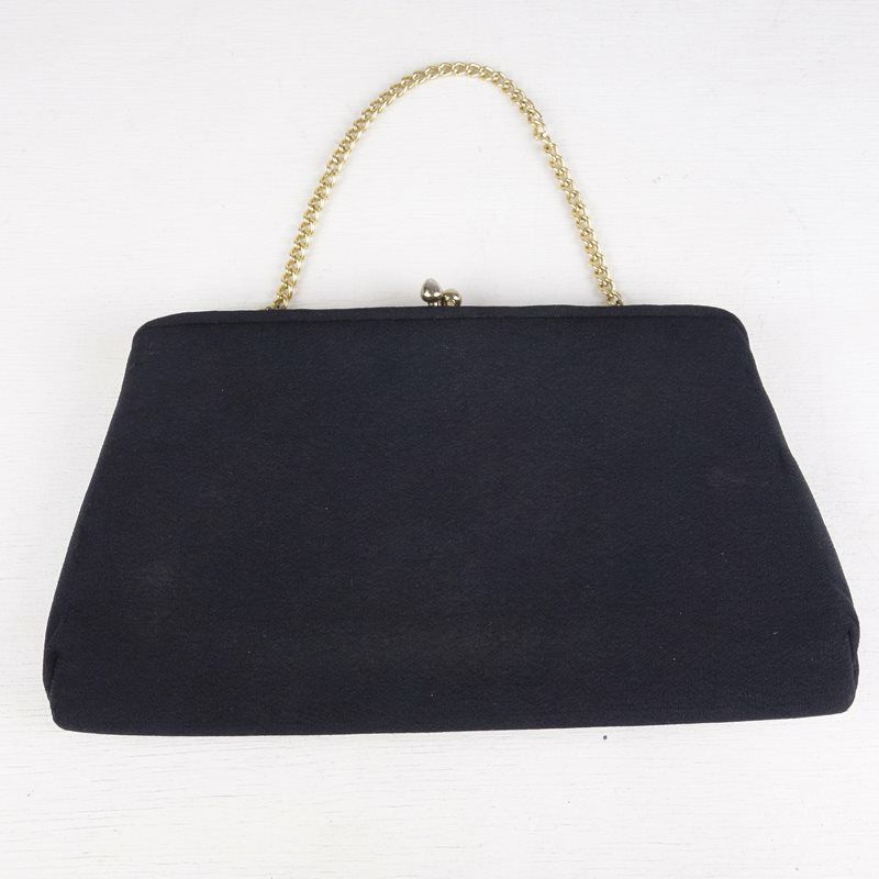 古着のがま口ハンドポーチ